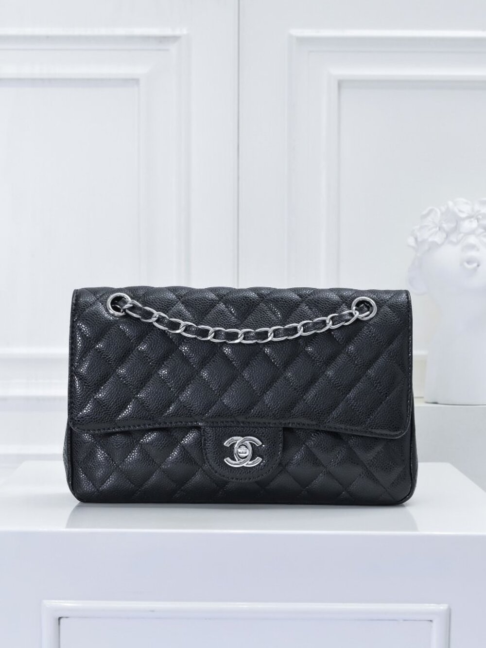 Chanel Classic Flap Bag in Black Caviar Leather with Silver-Tone Hardware